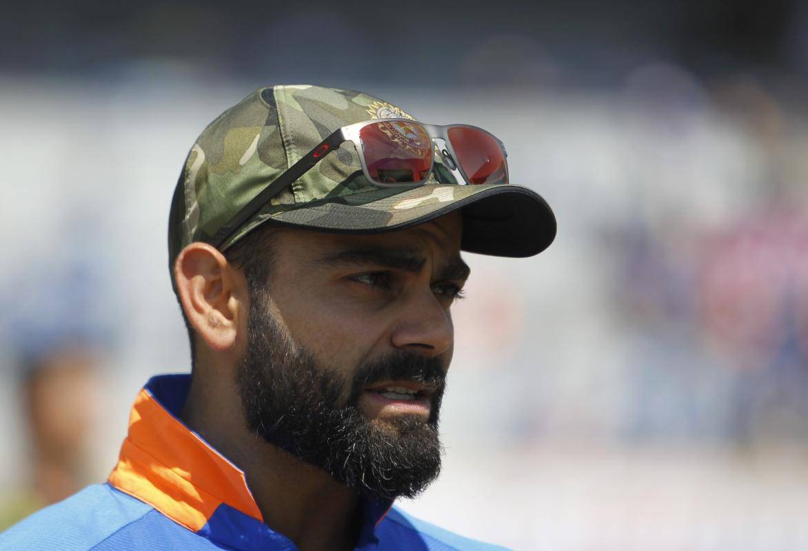 virat kohli in army cap
